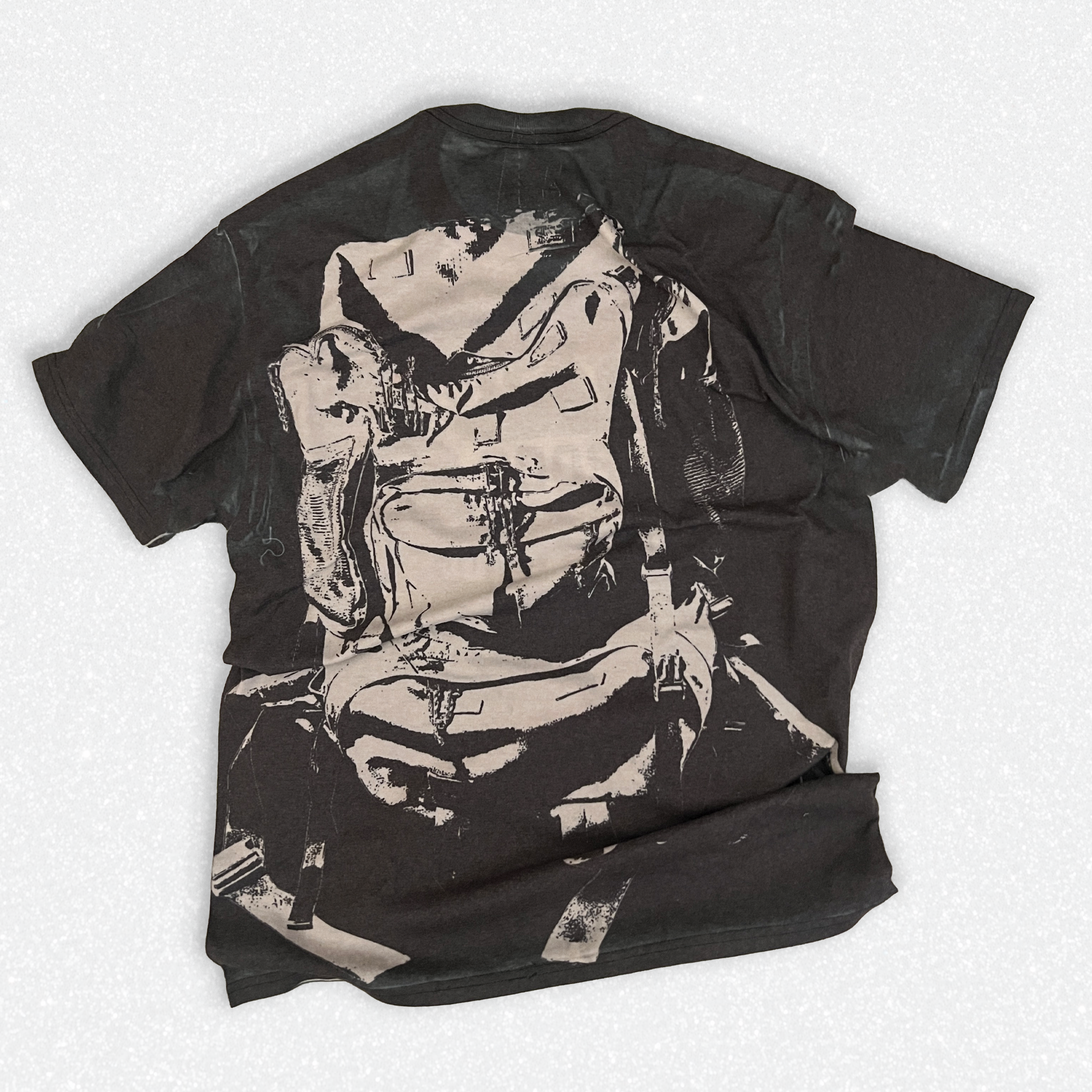 trompe backpack tee